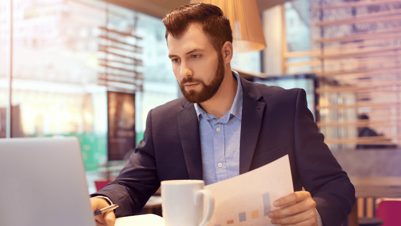 Restaurant manager working on computer