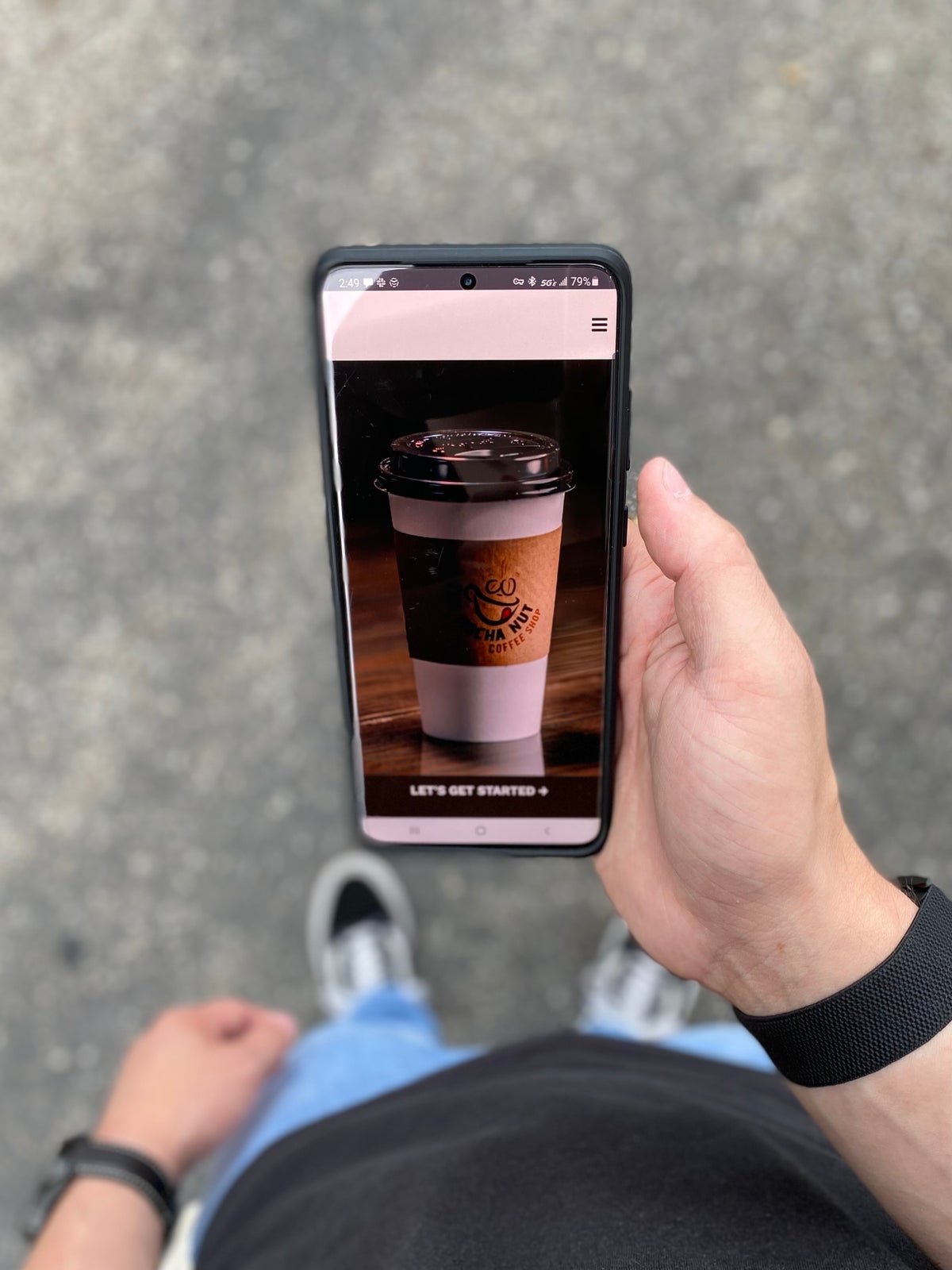 Mocha Nut app open on a phone in a person's hand